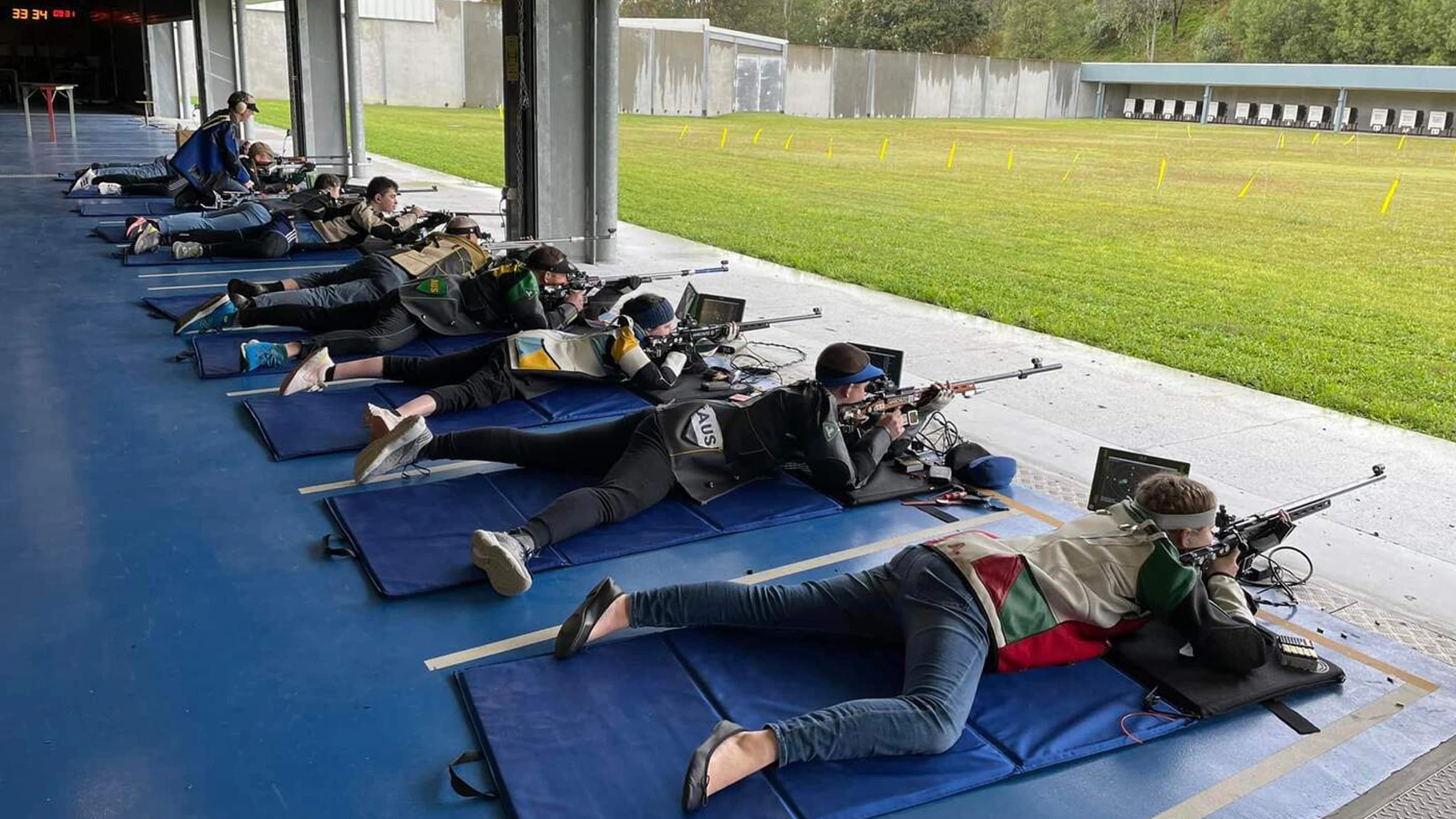 Shooters lying in a row competing 