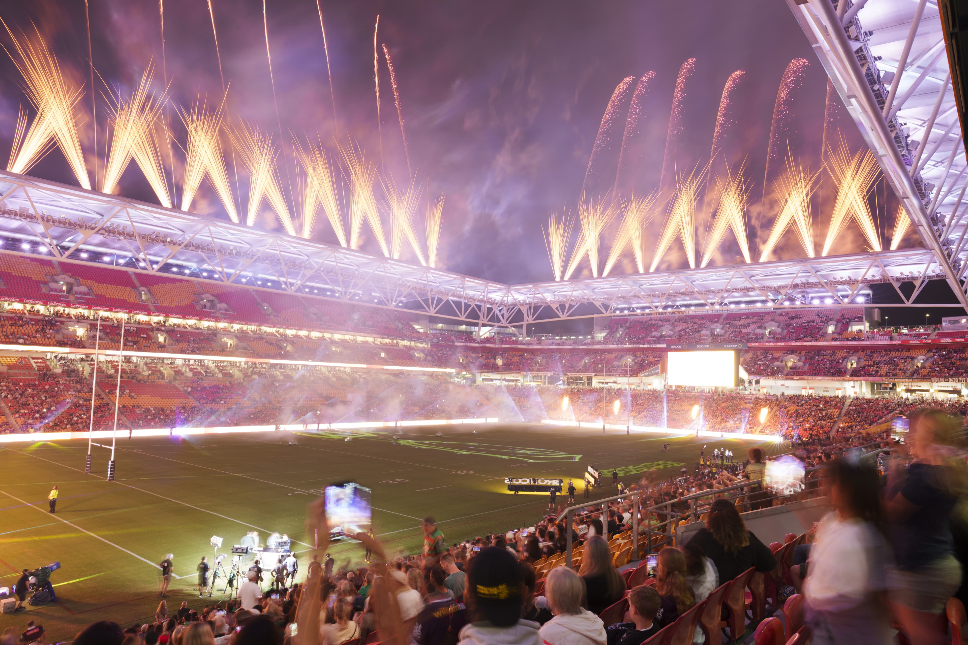 Spectators watching a game at the Suncorp Stadium