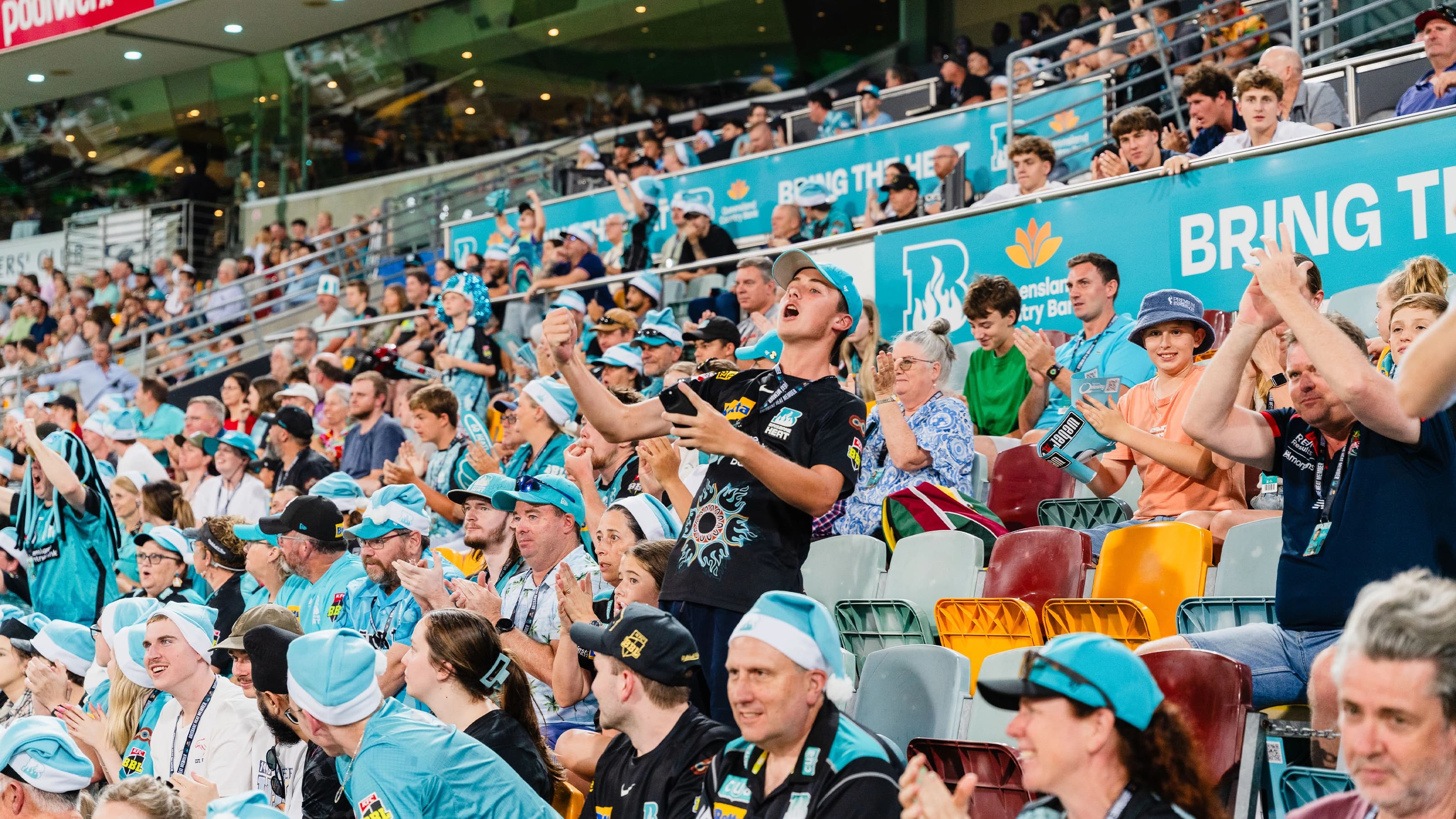 Crowd cheering at Brisbane Heat cricket game