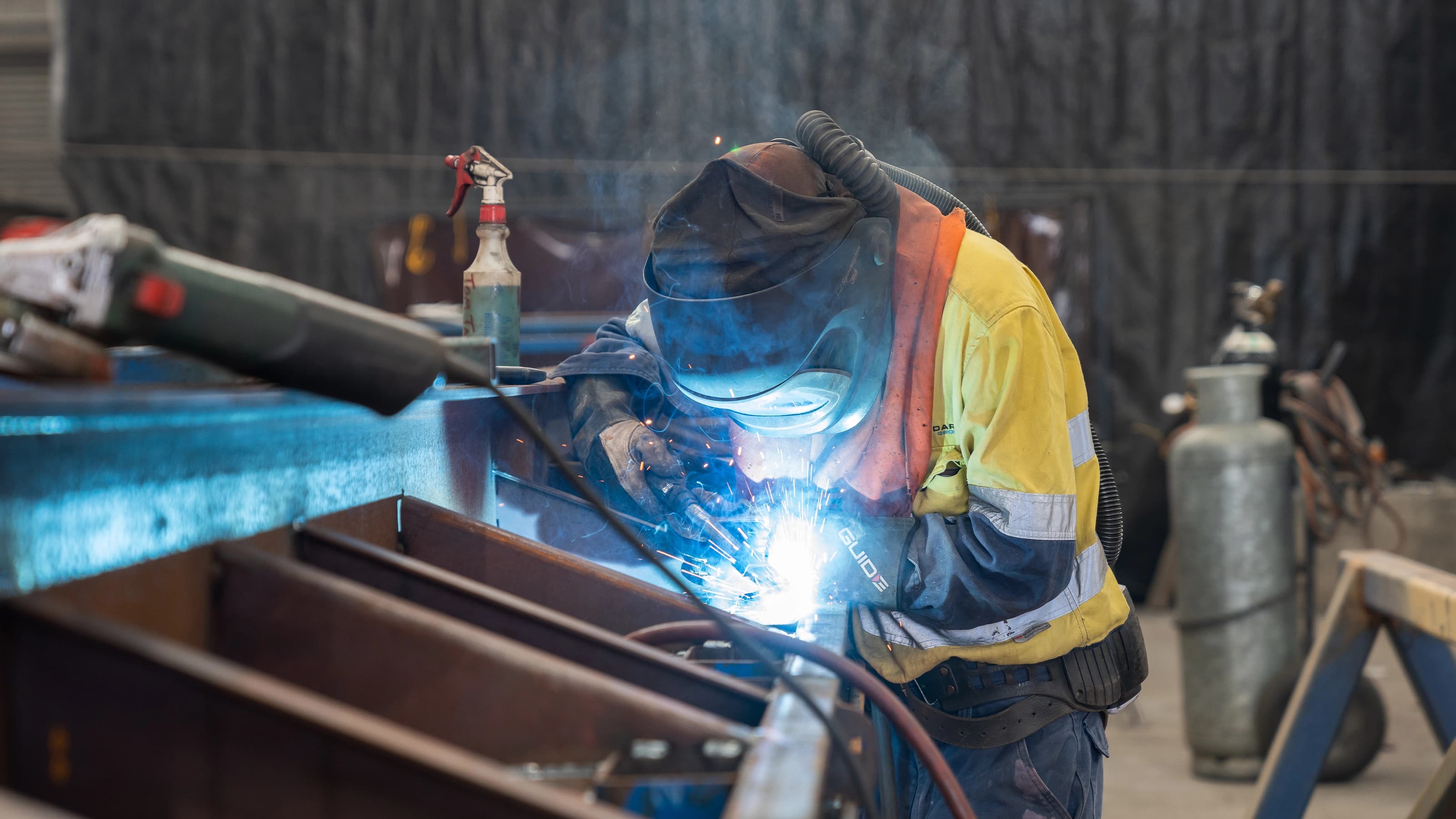 Welder working on construction