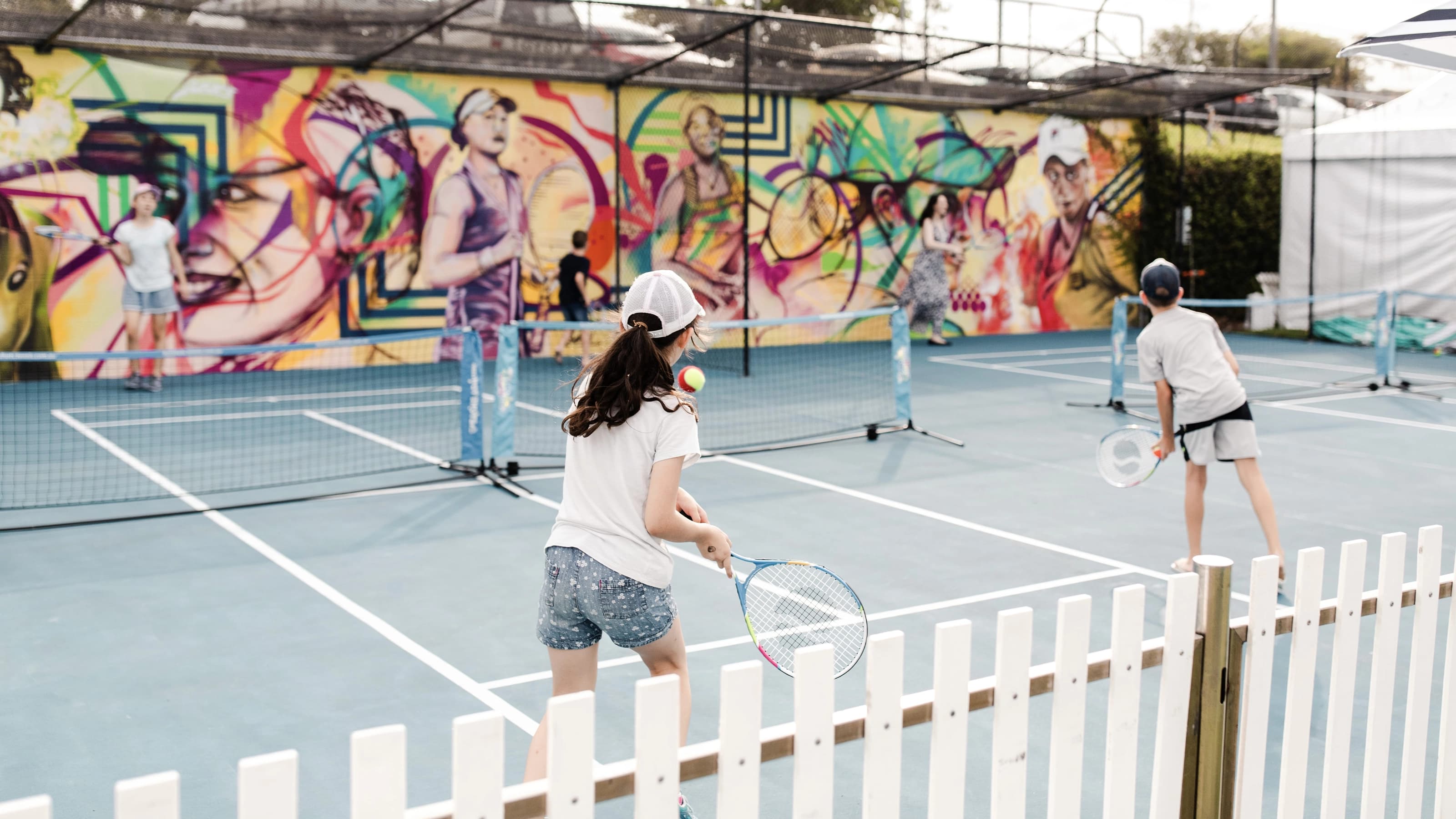 Children playing tennis